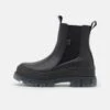 Buffalo Aspha Chelsea Mid - Bottines À Plateau - Black/Transparent